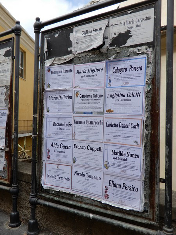 Postings of Deaths Are Located on Public Signage