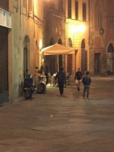 Kids Playing Ball in the Street in the Evenings