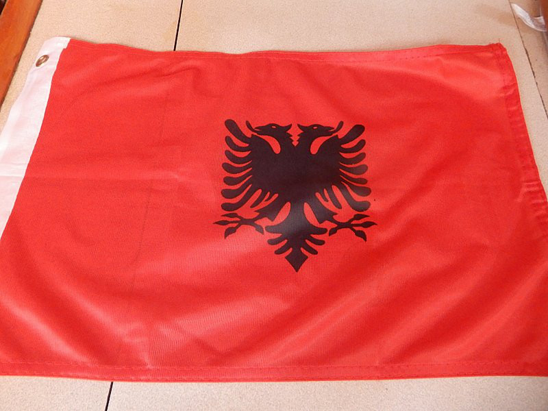 Up Went the Albanian Courtesy Flag