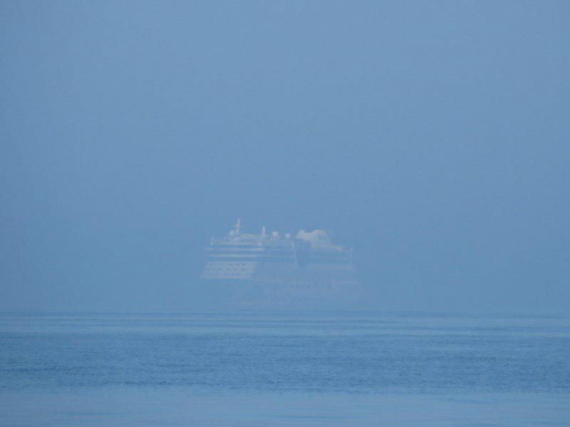 A Cruise Ship Appears Out of the Haze