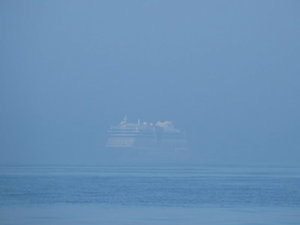 A Cruise Ship Appears Out of the Haze