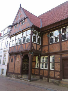 A Half Timber Building with Brick