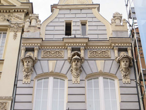 Details of the figures seen on the buildings here