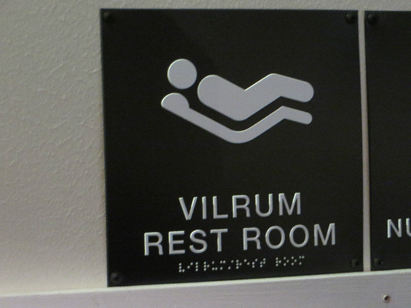 Next to the Sign for the Toilets at the Museum