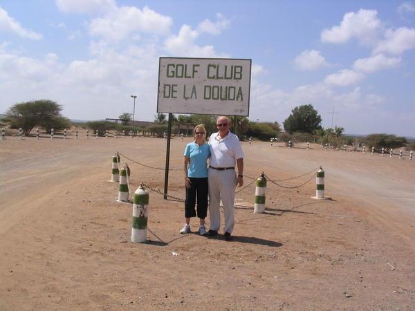 Phil & Monica at golf club entrance