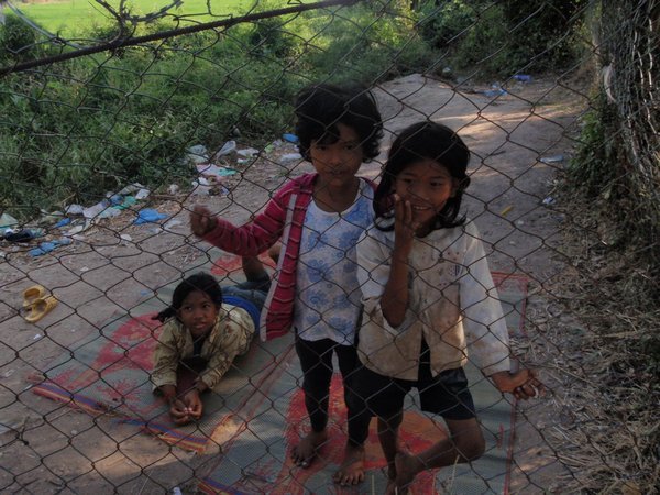Children begging at the killing fields