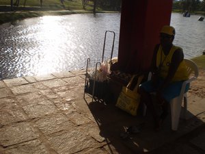 Lady selling fish food