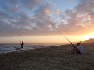 Dad & Trigger fishing at sunset