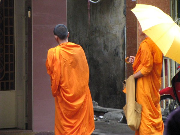 monks receiving alms