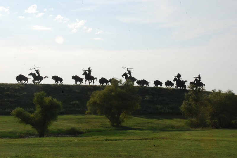 Cowboys and a herd behind the First Council Casino