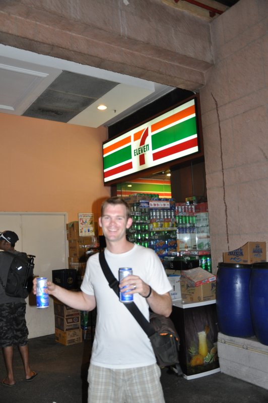 getting our $6 Singapore Dollar Tiger Beers @ 7 11