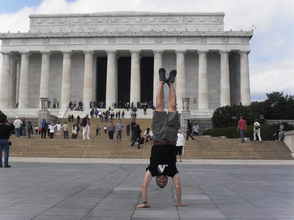 Doddys handstand next to the Lincoln Memorial