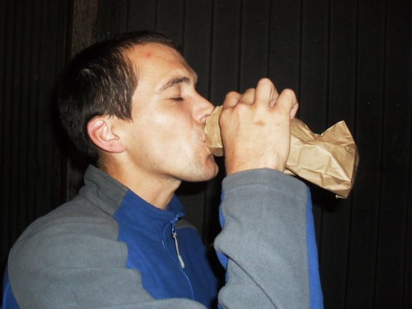 Drinking beer in a brown paper bag