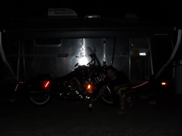 Brian next to his Airstream and Harley