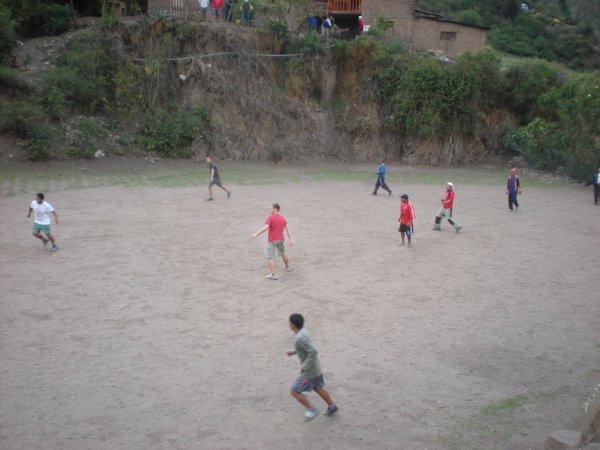 Playing football with the locals and porters