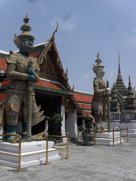 Statues guarding the temples at the Grand Palace