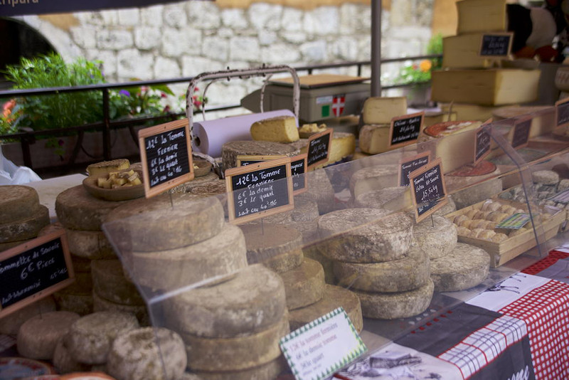 Cheeses for sale in market - Annecy