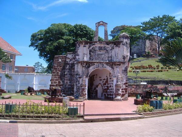remains of fort in melaka with church in background