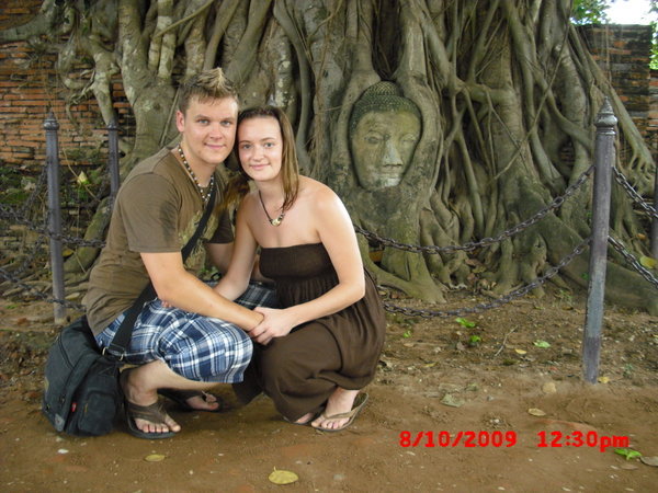 Us at The Sand-Stone Budda Head In Tree Roots