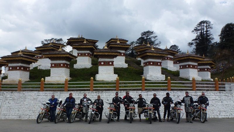 Its tough getting us all together. Finally a great shot with 100 Stupas in the background