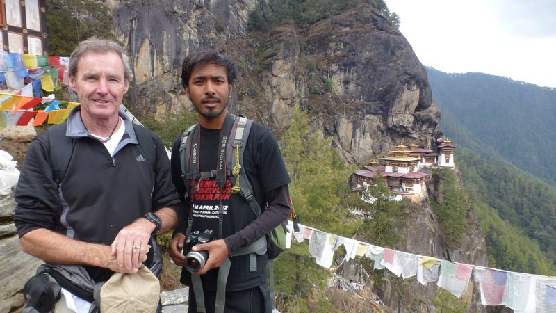Sabin, our motorcycle guide, and myself with the Tigers nest in the background