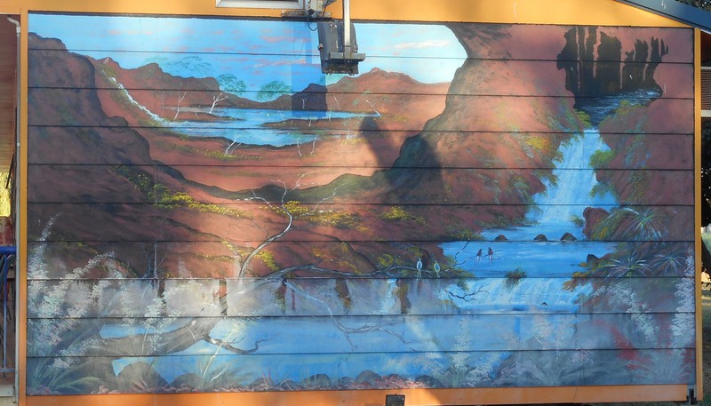 A Mural on the Side of a Cabin Block