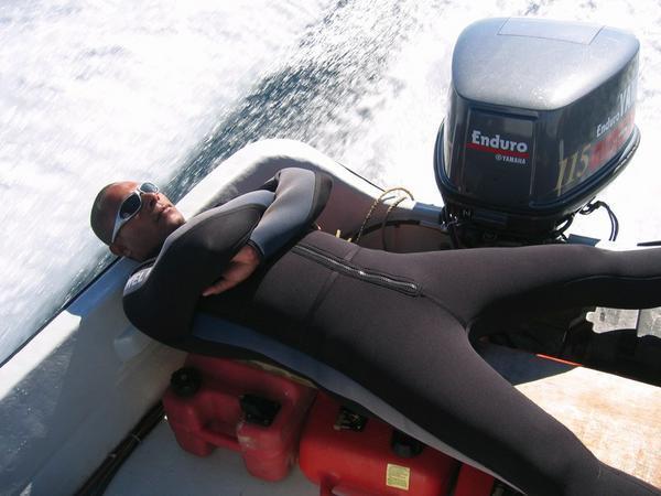 our divemaster has the best seat on the boat