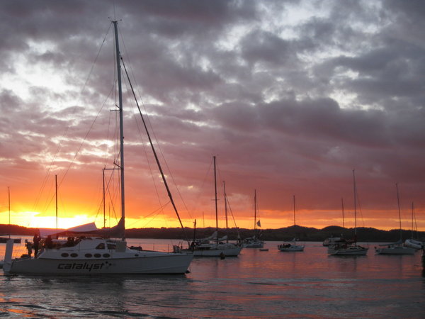 The sun setting among 250 boats