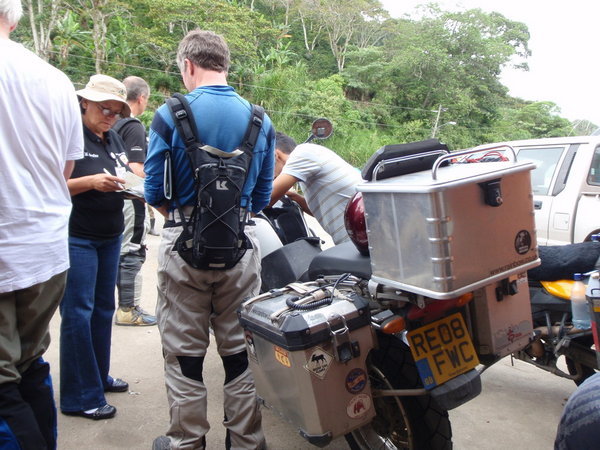 Edwin & bike being processed out of Honduras
