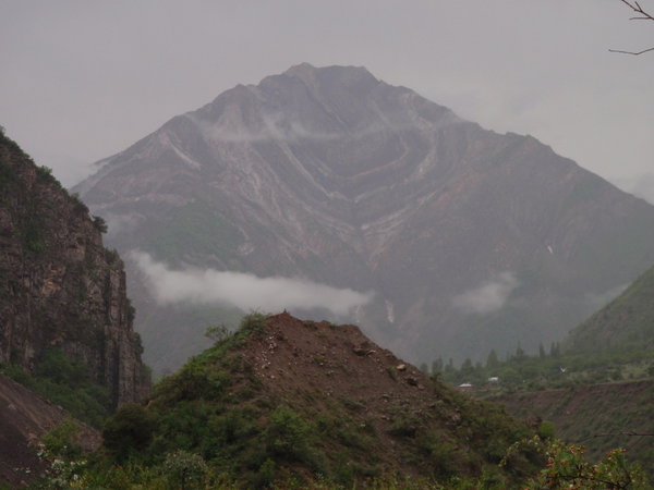 a rare view of a mountain top at the end of a rainy day