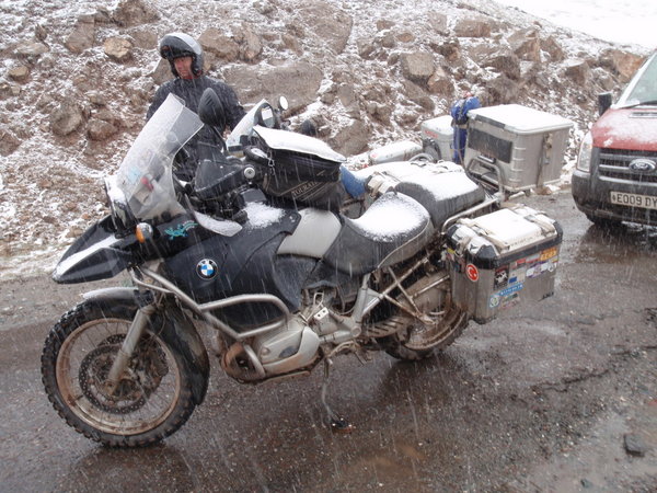 sleet and snow greet us when we get into Kyrgyzstan