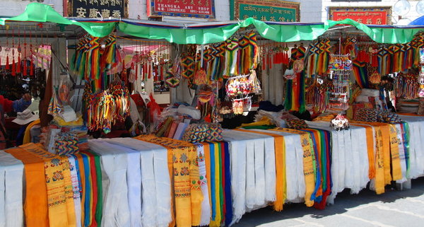 the main squre is lined with colourfull stalls selling temple offereings