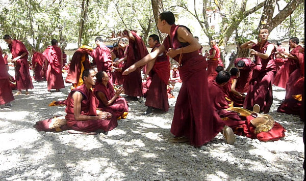 monks debating at Sera Monastery