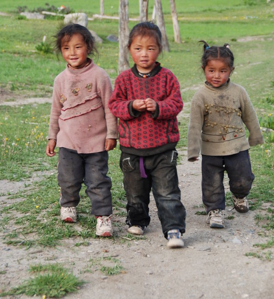 these 3 kids accompanied us through the village ....