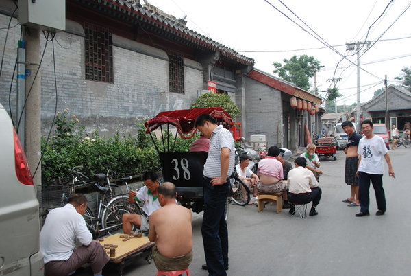 local lads taking it easy in the Hutong