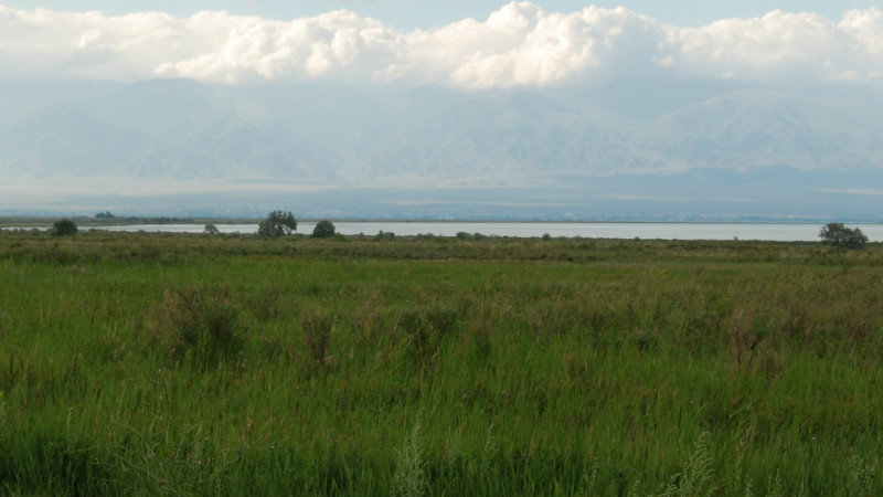 our fisrt glimpse of the lake with the snowy Tien Shan mountains on the far shore