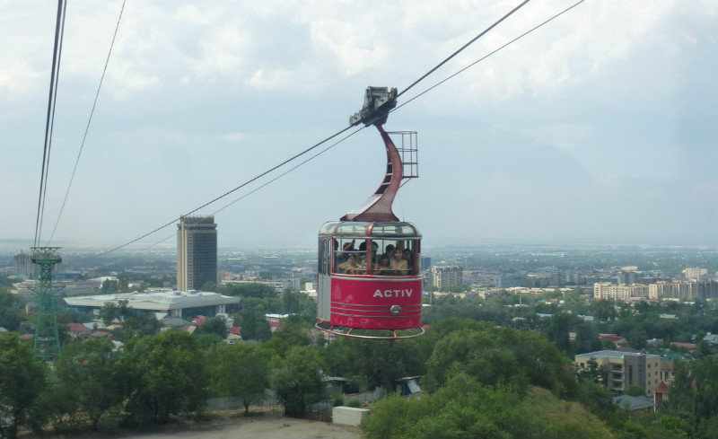 taking the Soviet era cable car to the top of Kok-Tobe