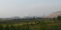 the town of Achinsk starts to emerge from the smog