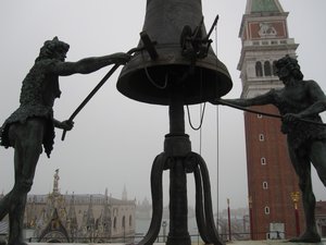 The men who hammer the bell every hour