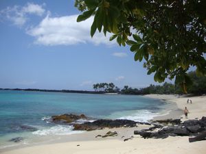 near deserted beach along the coast