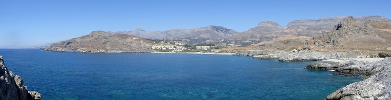 Amoudi Beach on the right and Damnoni in the centre background