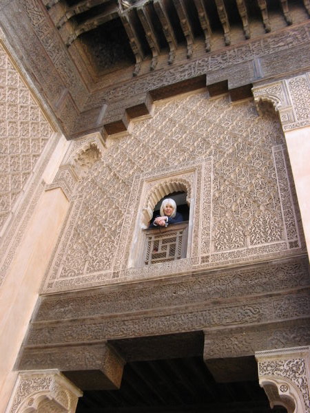 Prospective female student checking the accommodation at Ben Youssef Madrassa