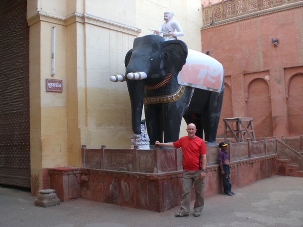 An elephant statue outside a temple