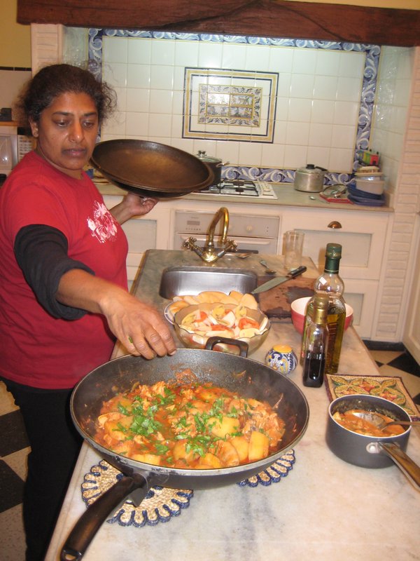 Dris making us spectacular curry with her dad's spices