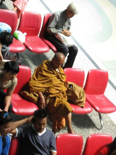 A monk in the Train Station