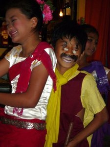 Children dancing traditional character roles at Veiyo Tonle