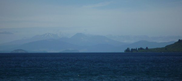 Distant view of the 3 volcanos behind Lake Taupo