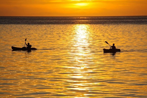 Kayaks at sunset