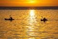 Kayaks at sunset