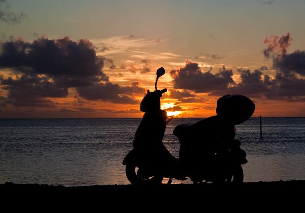 Aitutaki sunset with my motorbike